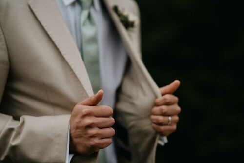 a Beige 3 Piece Suit